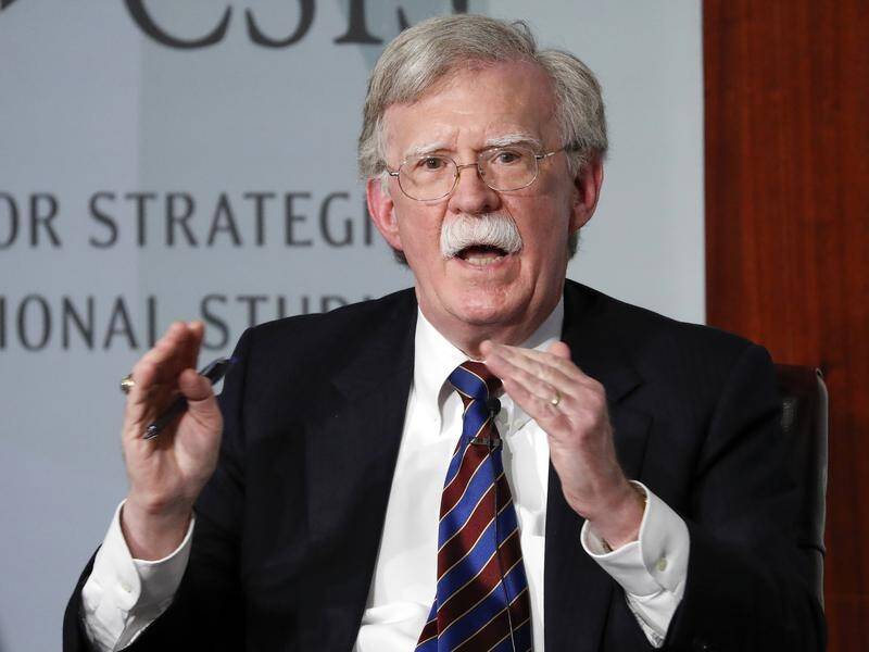 John Bolton says US President Donald Trump mentioned getting re-elected in talks with Xi Jinping.