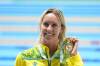 Emma McKeon of Australia with one of the six golds she won at Commonwealth Games 2022 in Birmingham. (AP PHOTO)