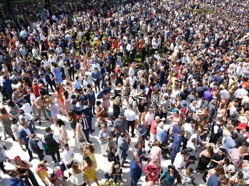 Victorian health authorities hope people won't be as close as usual during the Melbourne Cup.