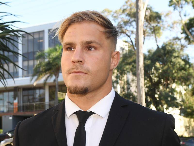 St George Illawarra player Jack de Belin has been stood down by the NRL as his court case continues.