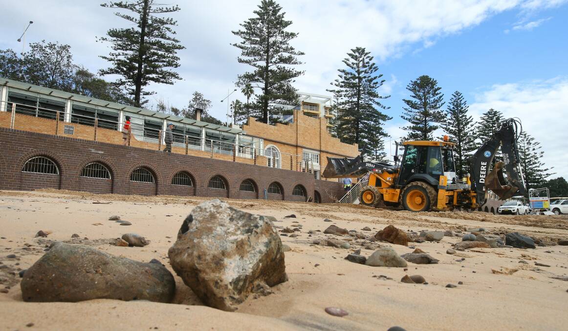 Big clean: Debris is removed from North Beach. Picture: KIRK GILMOUR