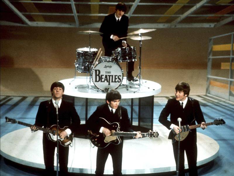 The Beatles perform on the Ed Sullivan Show in New York on February 9, 1964. (AP PHOTO)