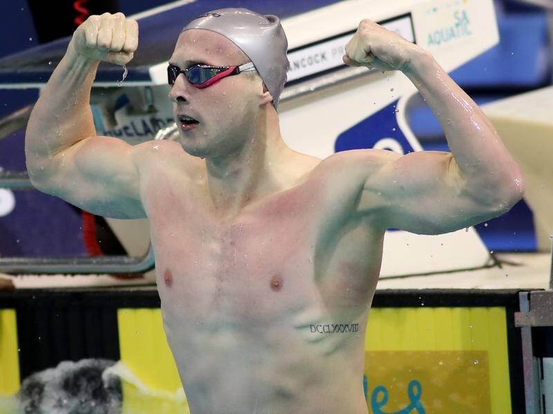 Matthew Wilson reacts to breaking the Commonwealth record in the men's 200-metre breaststroke.