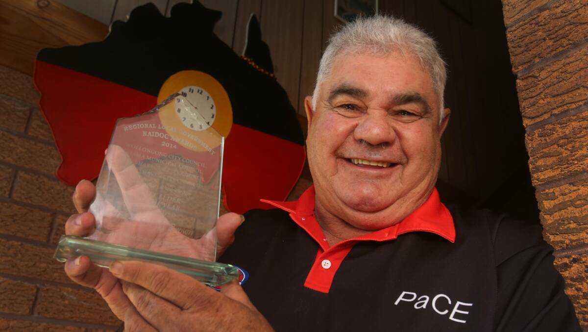 Uncle Gerald Brown with his award after being named male elder of the year. Picture: ROBERT PEET