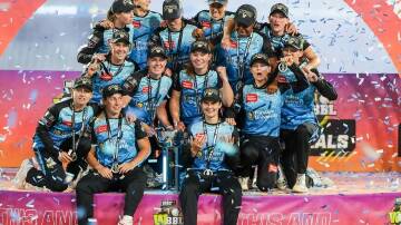 Adelaide Strikers enjoying their victory in the WBBL final over Brisbane Heat at the Adelaide Oval. (Matt Turner/AAP PHOTOS)