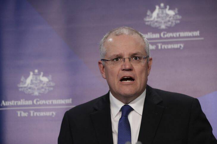Treasurer Scott Morrison addresses the media during a press conference on National Accounts at Parliament House in Canberra on Tuesday 5 December 2017. fedpol Photo: Alex Ellinghausen