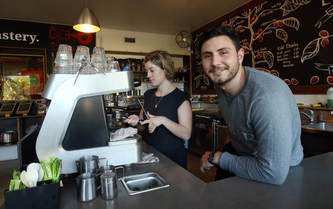 Delano Coffee's Boris Georgiou with barista Emma Terechous. Georgiou is heading to Sydney this month to the Rocks Aroma Festival, to teach people the secrets of brewing better coffee at home. Picture: KIRK GILMOUR