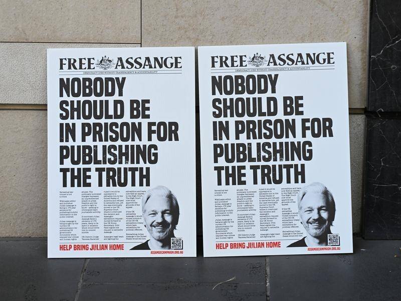 The media union has written to the government as Julian Assange marks five years in UK detention. (James Ross/AAP PHOTOS)