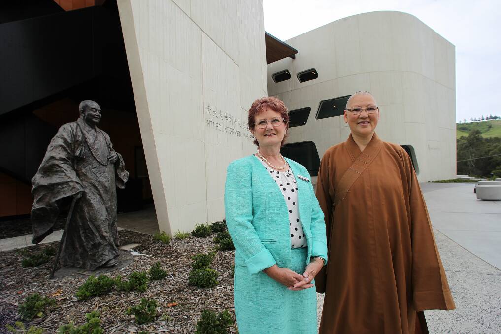  Nan Tien Institute director Venerable Miao You (right) and head of health and social wellbeing Dr Leigh Wilson outside the new NTI campus, which will officially open on March 1. The opening will include cultural performances and activities, a food fair and official tours. Picture: GREG TOTMAN