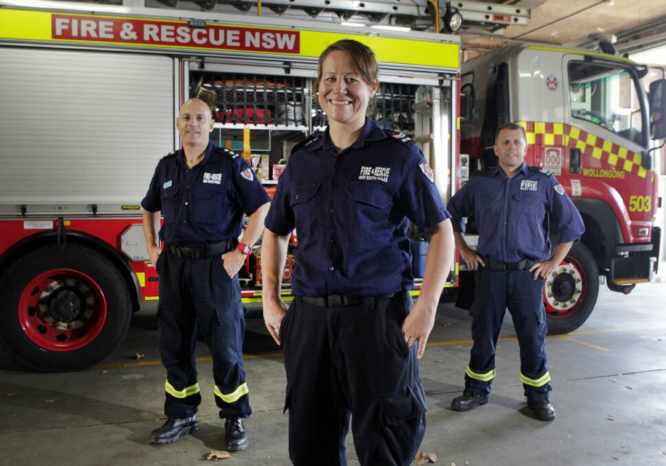 Local senior firefighter Letitia Harris with colleagues, station commander Greg Faulkner (left) and senior firefighter Brent Oyston, at Wollongong Fire Station. Picture: ANDY ZAKELI