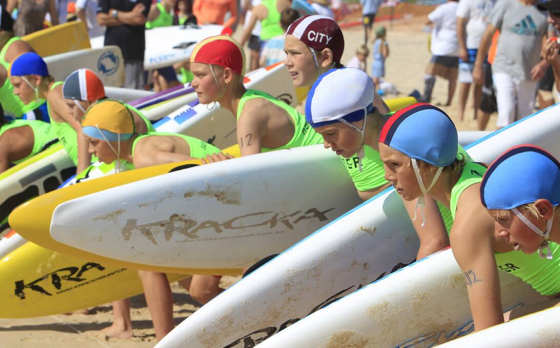 Ready to race: Young surf lifesavers at the start line ahead of an event in the boys under 12s in the opening round of the Sydney Water Series at Shellharbour Beach.