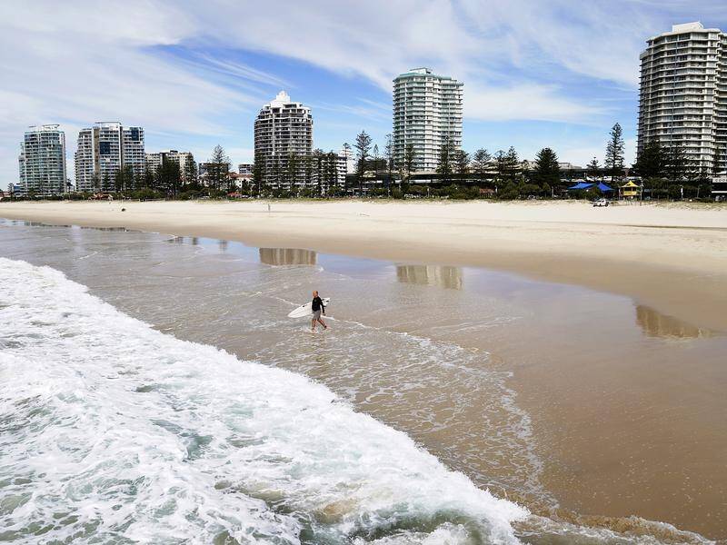 Queensland's tourism woes were exacerbated by unnecessary border closures, NSW's premier says.