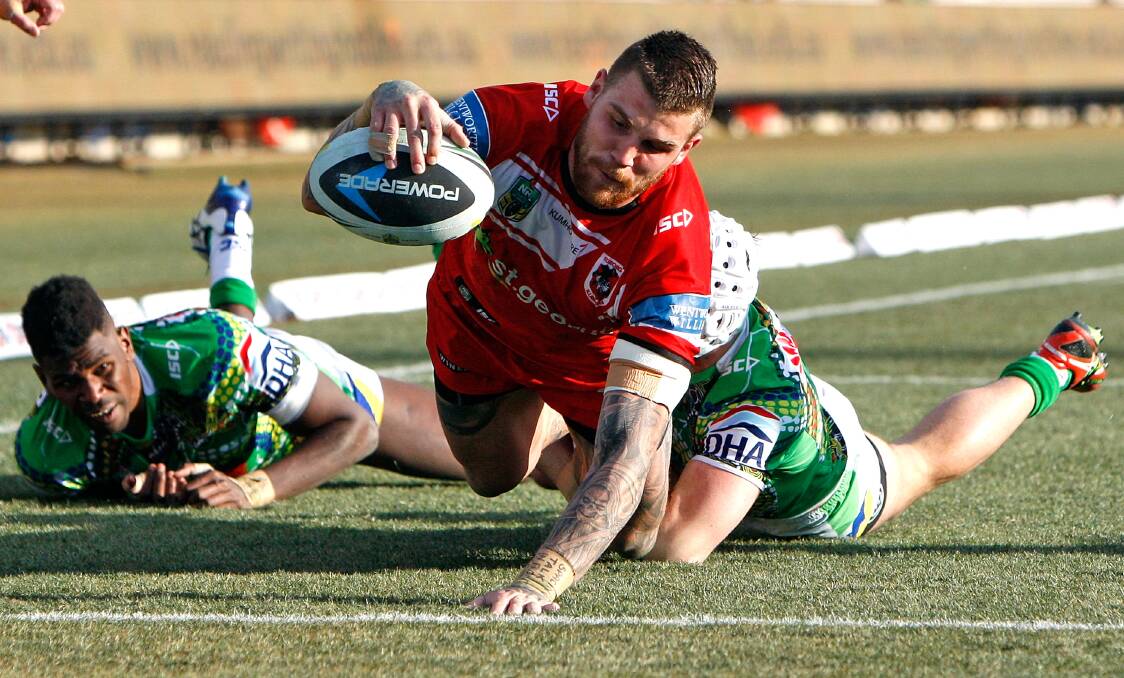 Raider-turned-Dragon Josh Dugan scores a try against his old team on Saturday. Picture: GETTY IMAGES