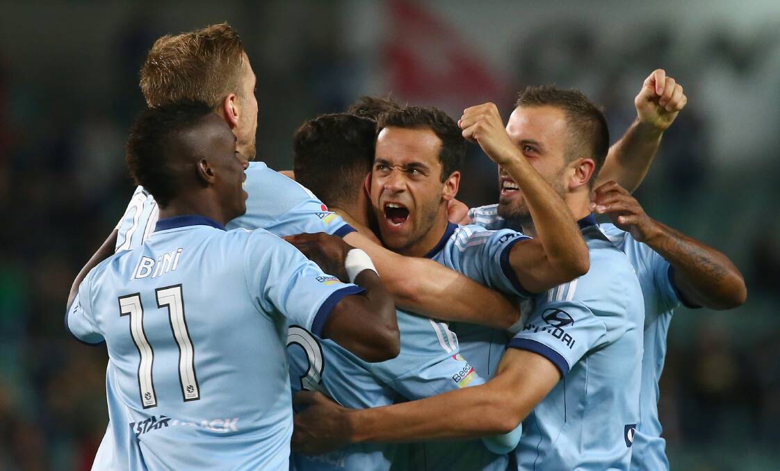 Alex Brosque celebrates his goal with Sydney FC teammates on Saturday. Picture: GETTY IMAGES