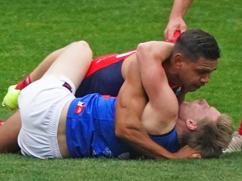 Neville Jetta and Charlie Spargo wrestle during a Melbourne Demons intra-club match at the MCG.