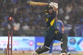 Ben McDermott gets bowled by India's Axar Patel in Australia's series-losing T20 loss in Raipur. (AP PHOTO)