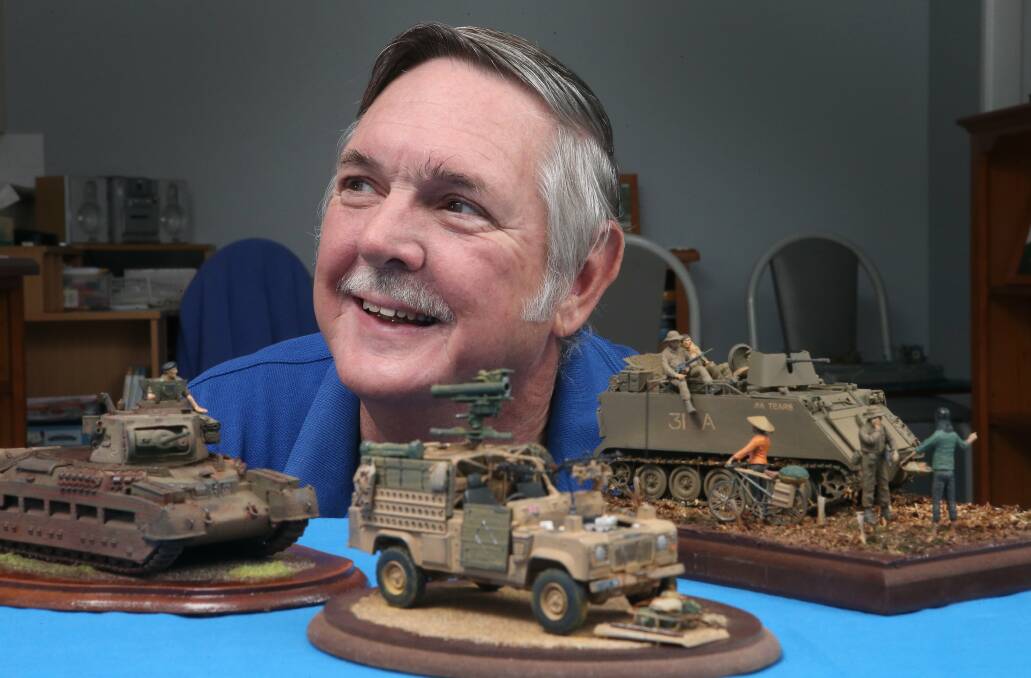 Illawarra Plastic Modellers Association president Patrick Brady shows off some of the models which will feature at the NSW Scale Model Competition and Expo in Berkeley on May 2-3.  Picture: KIRK GILMOUR 