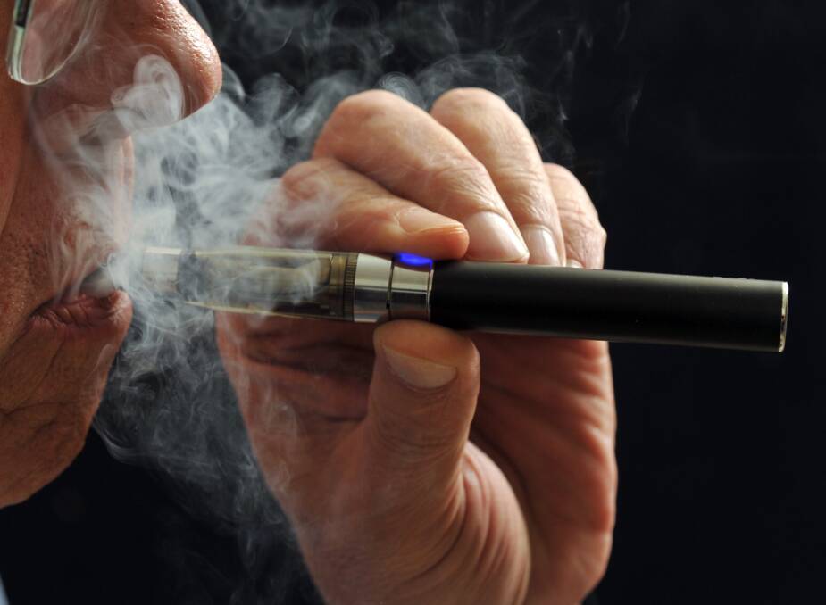 There is bipartisan support to ban the sale of e-cigarettes to minors. Picture: AP PHOTO