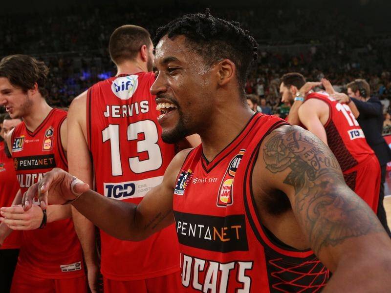 Bryce Cotton (C) has welcomed the signing of Dario Hunt as NBL champions Perth's third import.
