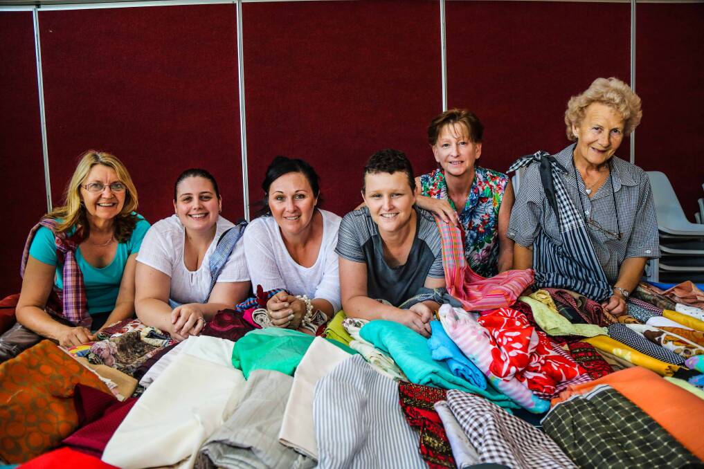 Robyn Greenlees, Amanda Priestley, Shannon Couley, Lauri Fettell, Sandra Williams and Margaret Rogers are the founders of Community Fabric Cutting Day - making pouches for breast cancer patients. Picture: GEORGIA MATTS