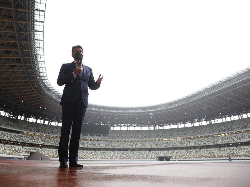 Athletics boss Sebastian Coe addresses the media during Thursday's visit of Tokyo's Olympic Stadium.