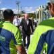 Metricon Homes staff talk with Prime Minister Scott Morrison at a site in Brisbane.