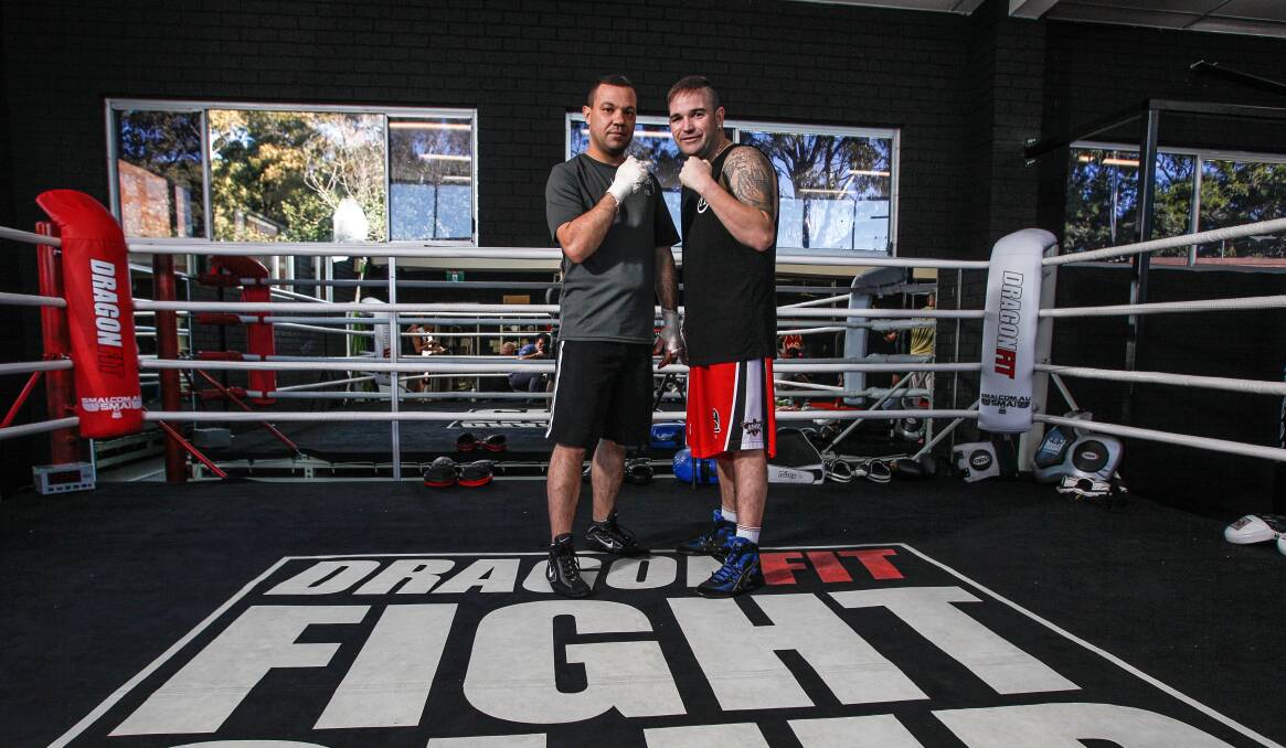 Mick Mlacic preparing for his first bout in a decade with his coach Brad Gallagher. Picture: CHRISTOPHER CHAN