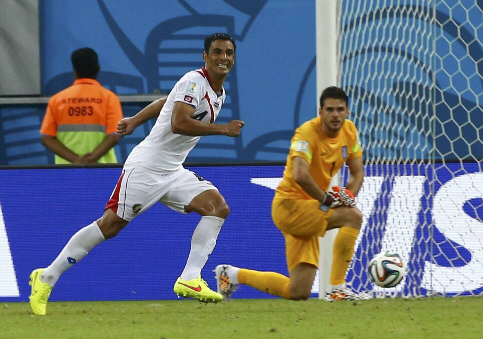 Costa Rica's Michael Umana reacts after slotting home the decisive spot-kick in the penalty shootout win against Greece. Picture: REUTERS