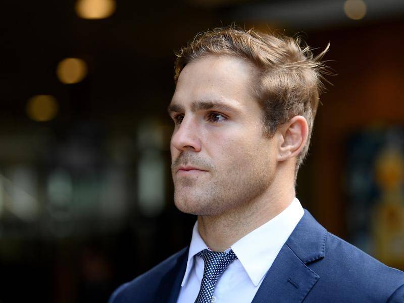 Jack de Belin denies he and his co-accused cheered each other during an alleged rape.