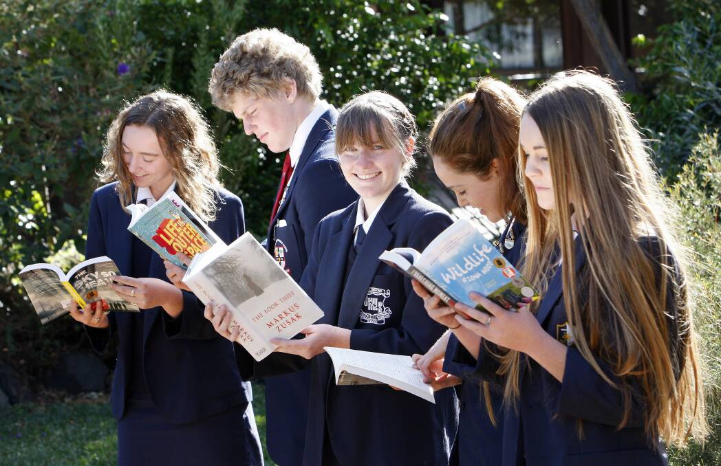 Students Mahalia Crawshaw, Dominic Mortimer, Louise Ellsmore, Emily I'Ons and Isabella Kudor took part in St Joseph's Catholic High School's Literary Luncheon on Tuesday. Picture: ANDY ZAKELI