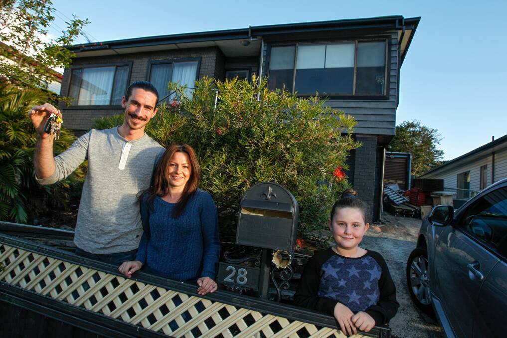 The Higgins family, Adam, Bernadette and Tasha, at their Lake Heights home.