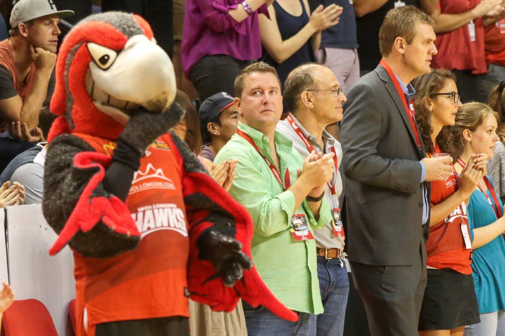 Next move: Hawks owner James Spenceley, standing next to the Hawks' mascot, is looking for sponsors to keep the club alive. Picture: ADAM McLEAN