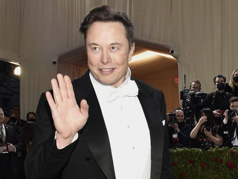 "I will resign as CEO as soon as I find someone foolish enough to take the job!," Elon Musk says. (AP PHOTO)