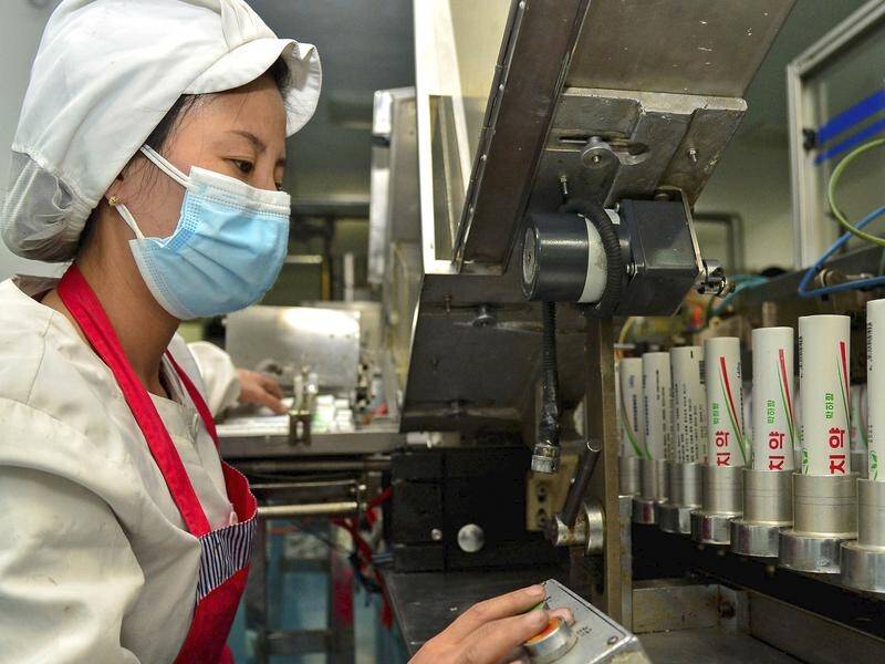 Factories have boosted production of of medical supplies in Pyongyang and nearby regions, KCNA says.