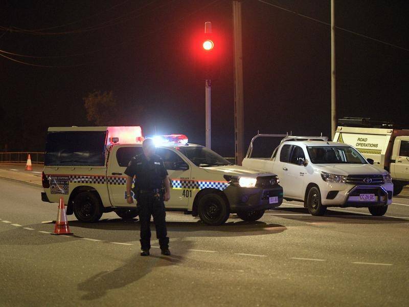 A gunman opened fire with a sawn-off shotgun in Darwin, killing four people, before being arrested.