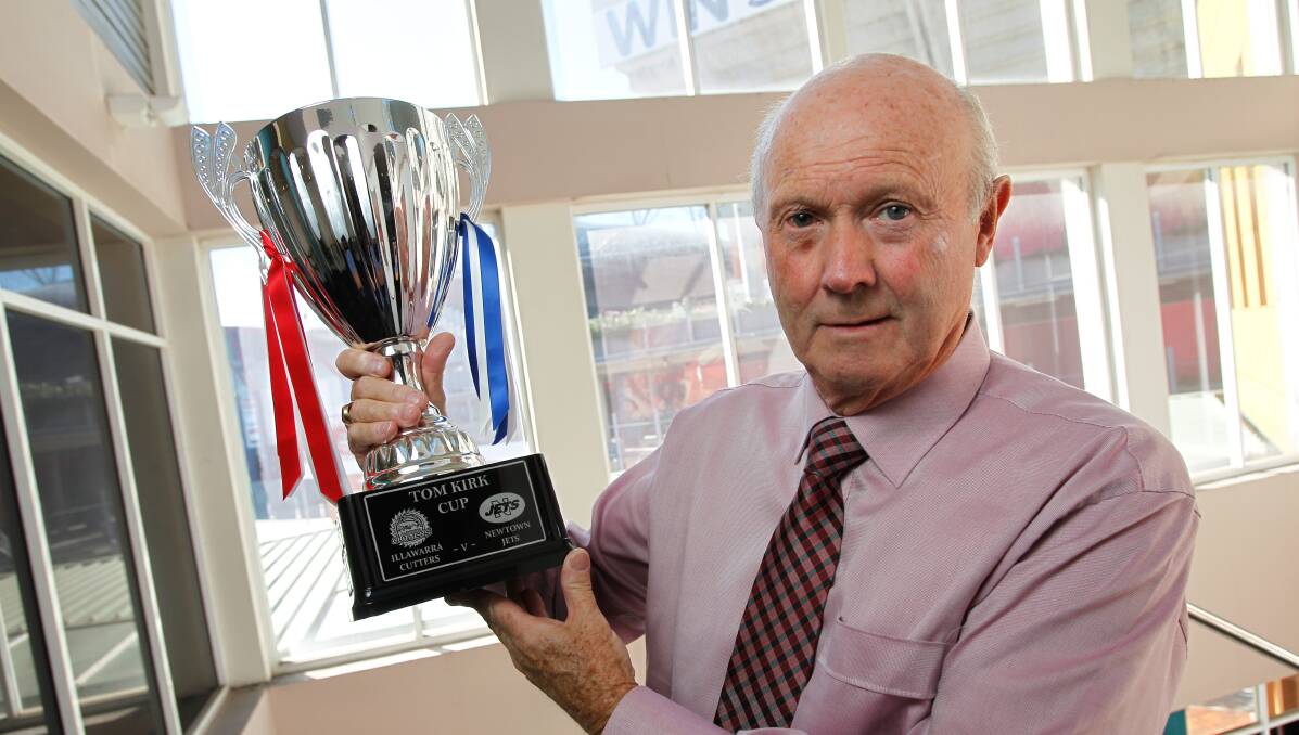 Ian Kirk with the trophy named after his father Tom. Picture: CHRISTOPHER CHAN