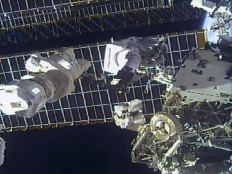 Two NASA astronauts have repaired a broken antenna outside the International Space Station.