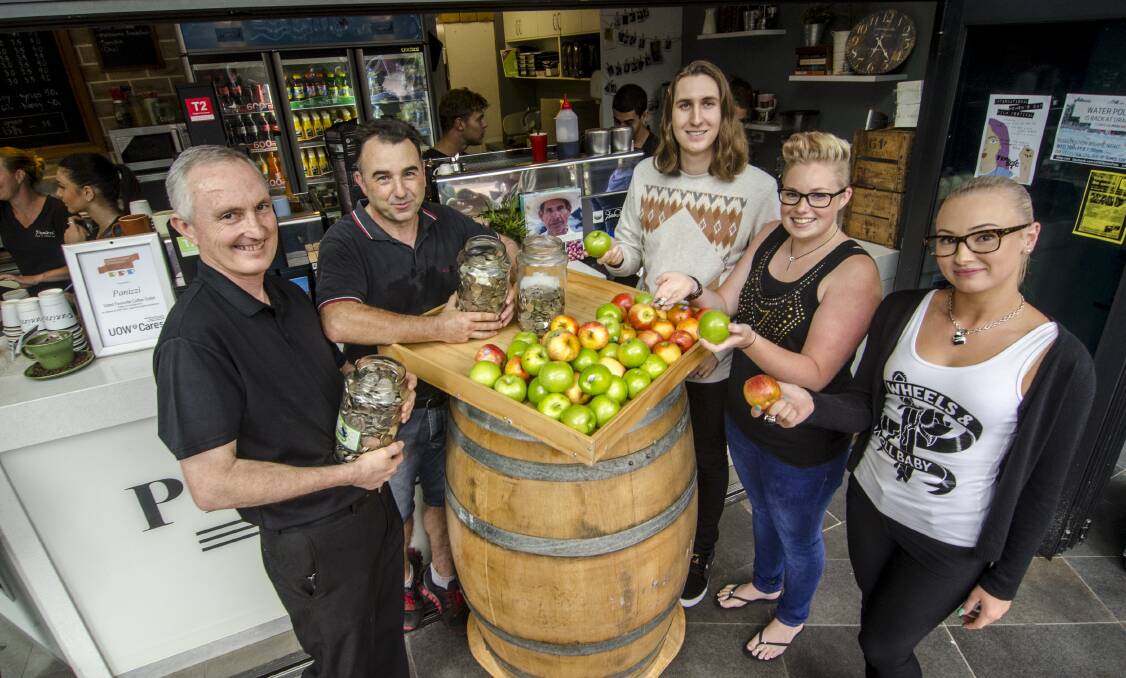 Panizzi cafe's Hal Davies with manager Vito Rizzo and UOW third year primary education students Joshua Erskine, Brodi Leussink and Tanaya Webb.Picture: SEAN MAGUIRE