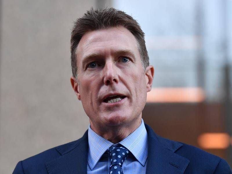 Federal Industry Minister Christian Porter has ended his defamation case with the ABC.
