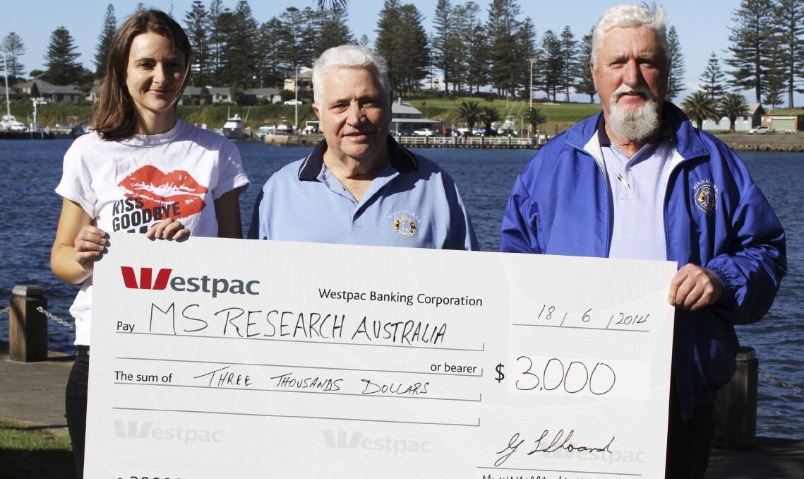 MS Research Australia's Zoe Chapman with Minnamurra Lions' Ken Magnus and president Geoff Shoard at the presentation of the cheque from this year's Kiss MS Goodbye. Picture:  DAVID HALL