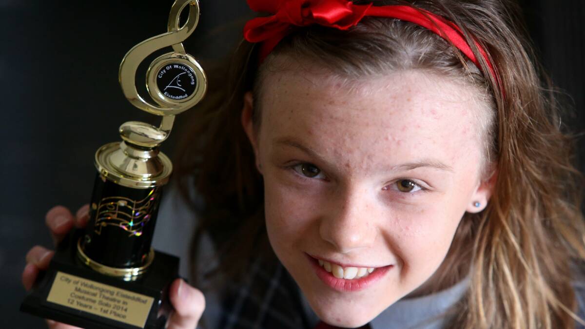 Elissa Sherley from Sutherland with the trophy recognising her achievement in the Wollongong Eisteddfod. Picture: ROBERT PEET