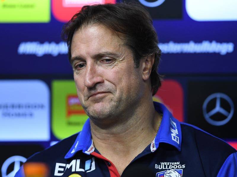 The Western Bulldogs have locked in coach Luke Beveridge for another three years until 2023.