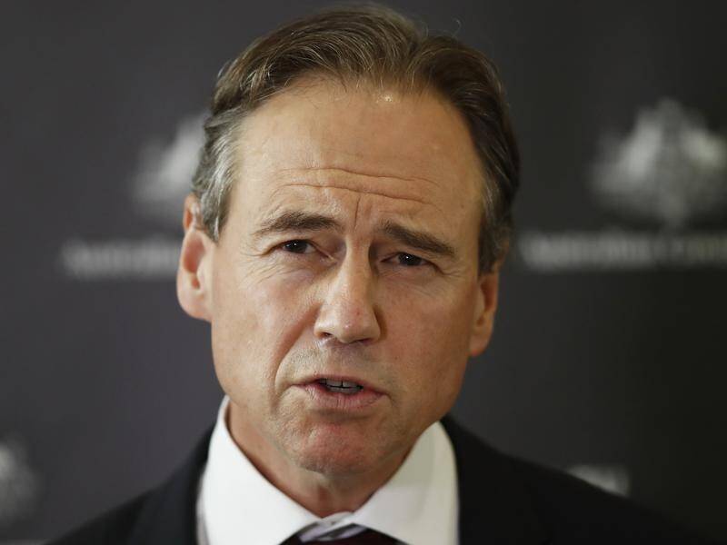 Greg Hunt has announced Australia's international travel ban will be extended for three months.