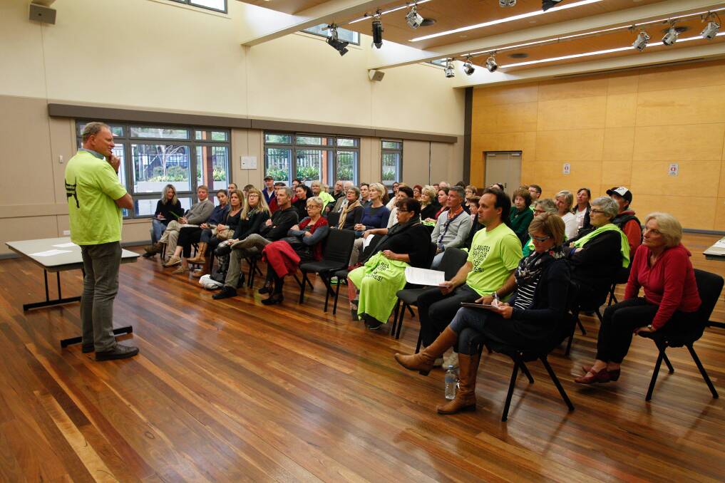 Solution wanted: Wollongong Dog Community meets at Thirroul library to discuss proposed changes to the council's policy for dogs on beaches. Picture: CHRISTOPHER CHAN