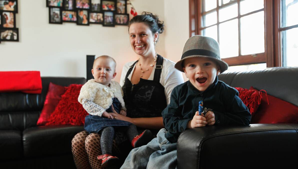 Krystal McKenna, of Koonawarra, with children Amelie and Arron, fears that parenting would get even tougher. Picture: CHRISTOPHER CHAN