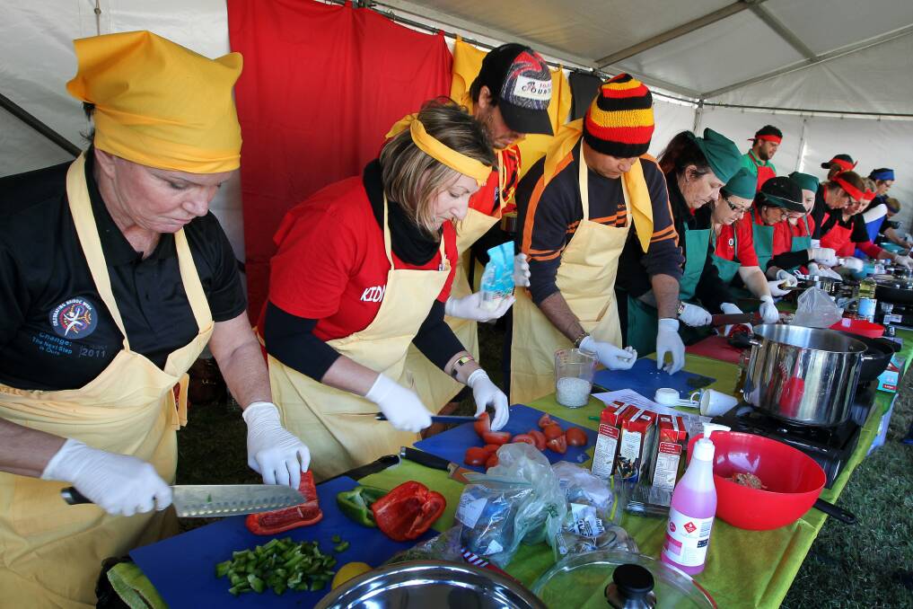 Entrants rustle up some appetisers in Friday's cook-off, held at Warrigal Employment in Windang. Picture: SYLVIA LIBER