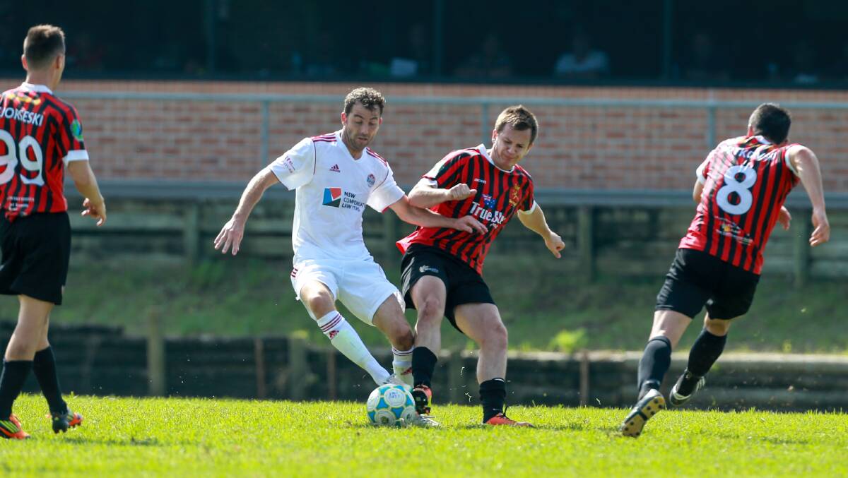 Battle: Eagle Chris Smith (left) and Lions' Alex Todoroski fight for possession on Sunday. Picture: CHRISTOPHER CHAN