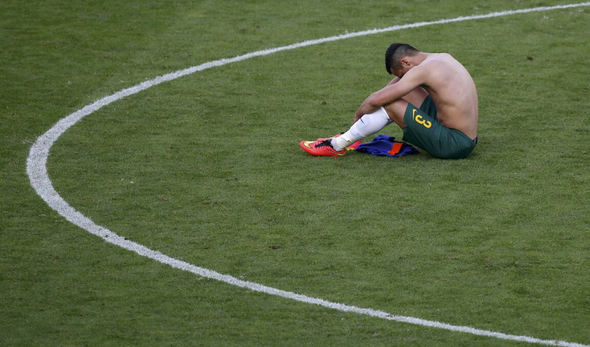 Jason Davidson is left to ponder after the loss to the Netherlands at the Beira Rio Stadium in Porto Alegre. Picture: REUTERS