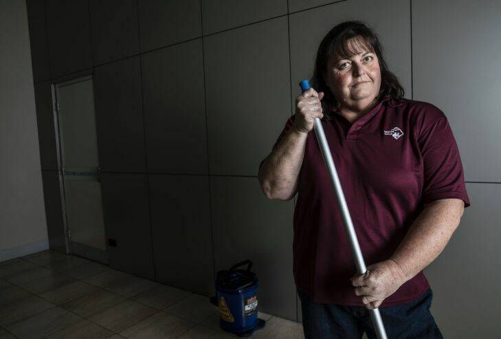 Cleaner Judith Barber is among 7000 NSW school cleaners worried they will be short-changed for the number hours they work under proposals to pay them according to the size of space they clean. Photo: Jessica Hromas