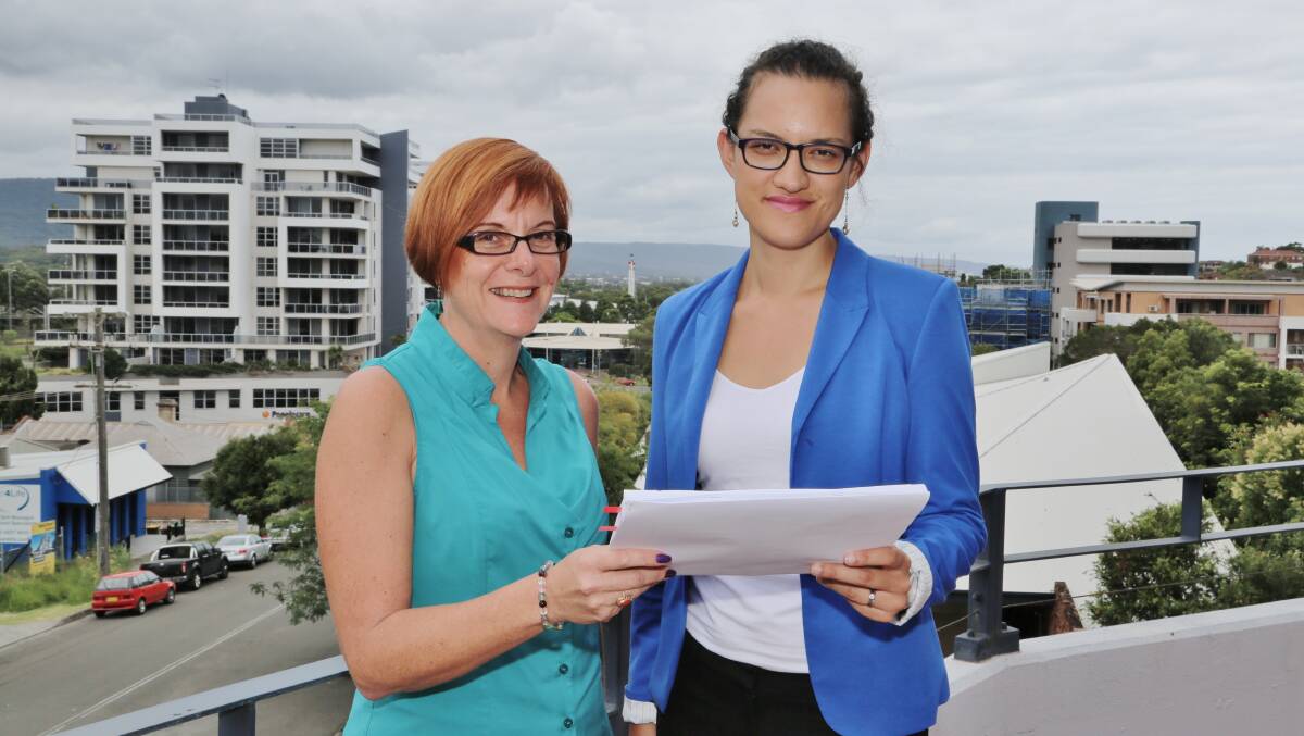 Illawarra Business Chamber chief executive Debra Murphy and policy manager Jancey Malins discuss the impact of red tape on businesses in the region. Picture: GREG ELLIS